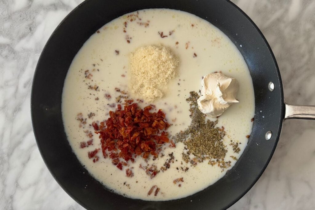 Cream cheese and parmesan in skillet