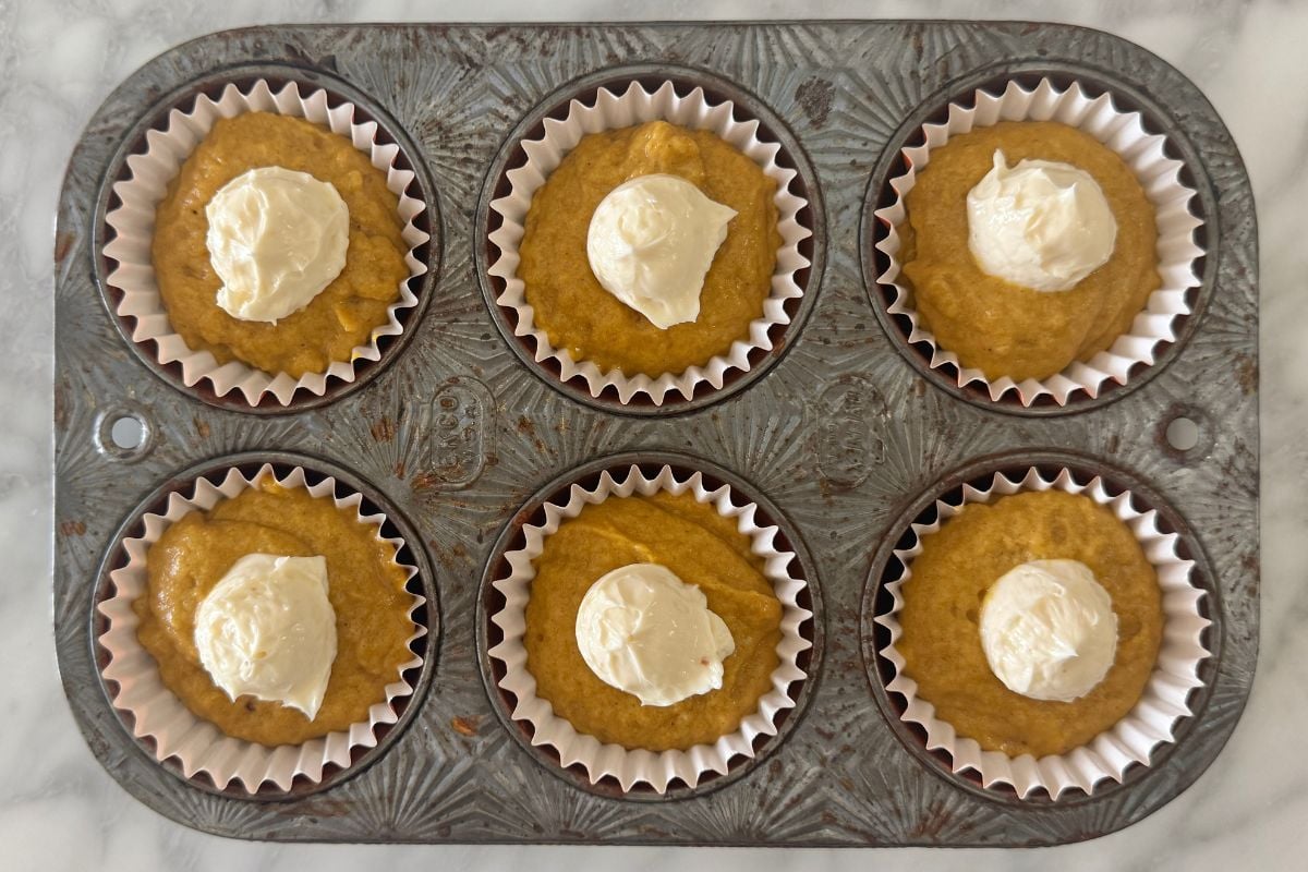 Cream cheese filling on pumpkin muffins