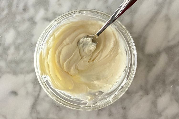 Cream cheese frosting in a bowl