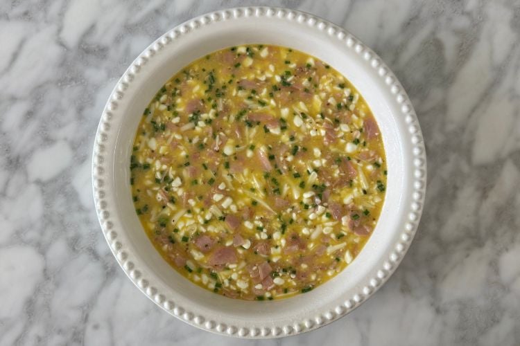 Crustless ham and cheese quiche in pie pan