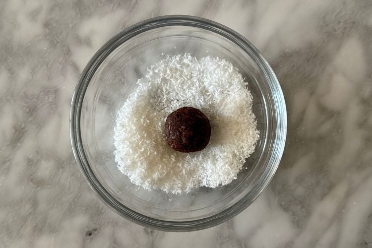 Date ball in shredded coconut