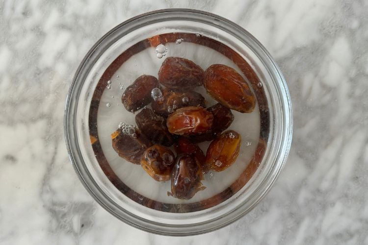 Dates in a bowl with water
