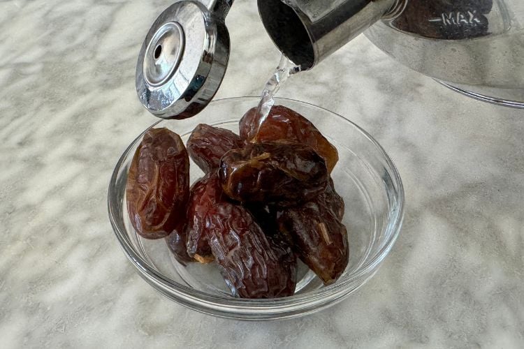 Dates soaking in hot water