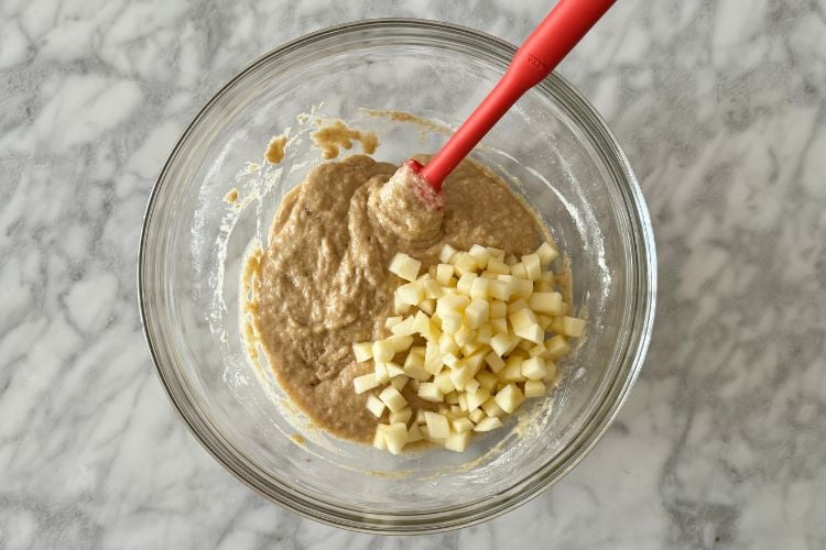 Diced apples in the muffin batter