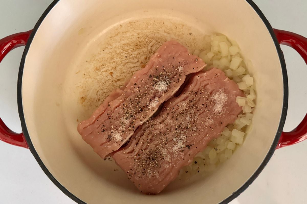 Diced onion and seasoned ground turkey in large pot