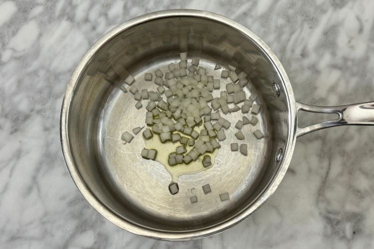 Diced onions in saucepan