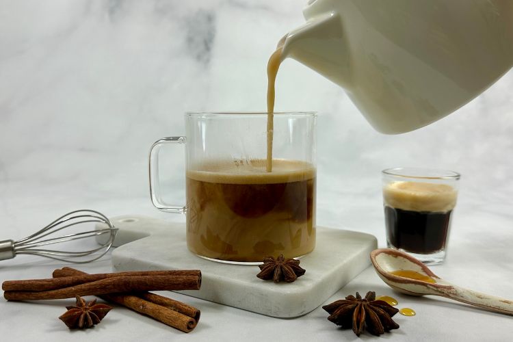 Dirty chai tea latte in cup