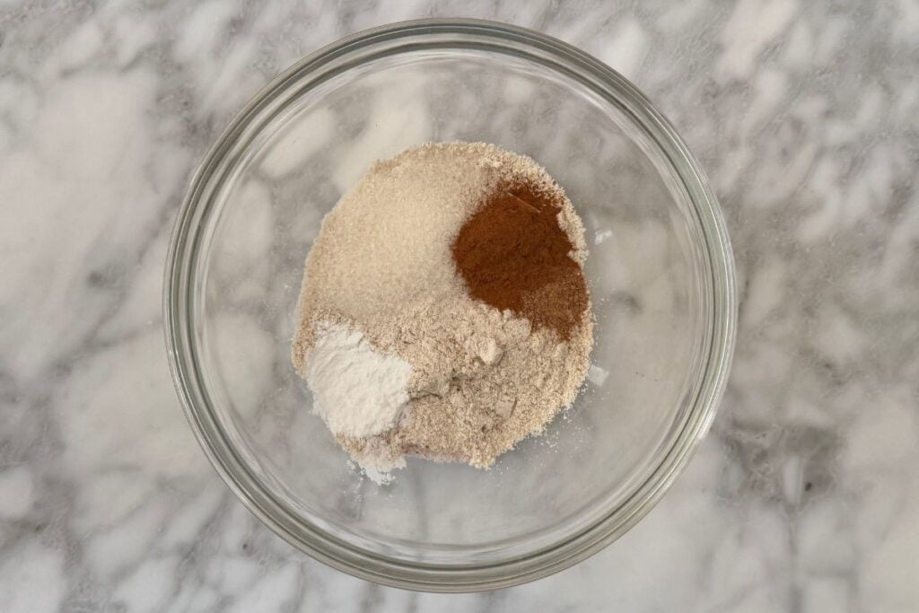 Dry ingredients needed for carrot mug cake in bowl