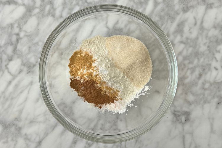 Dry ingredients for gingerbread muffins in bowl