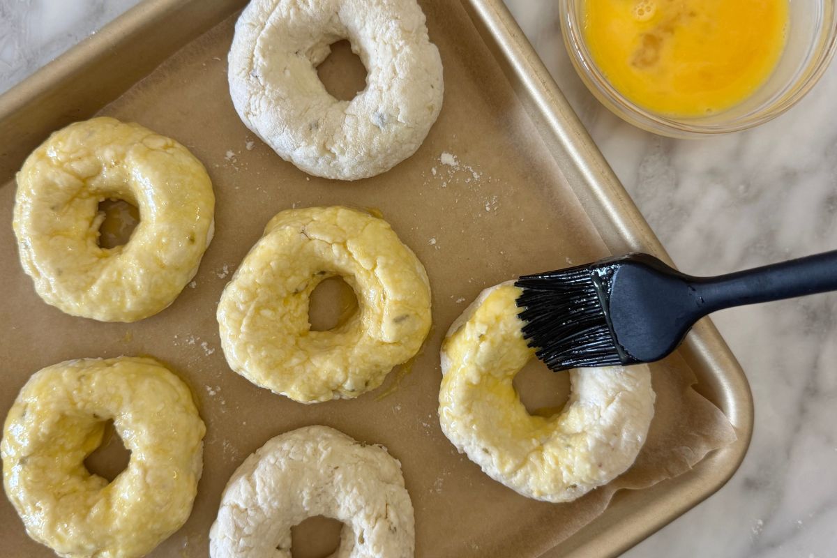 Egg wash on jalapeño cheddar bagels