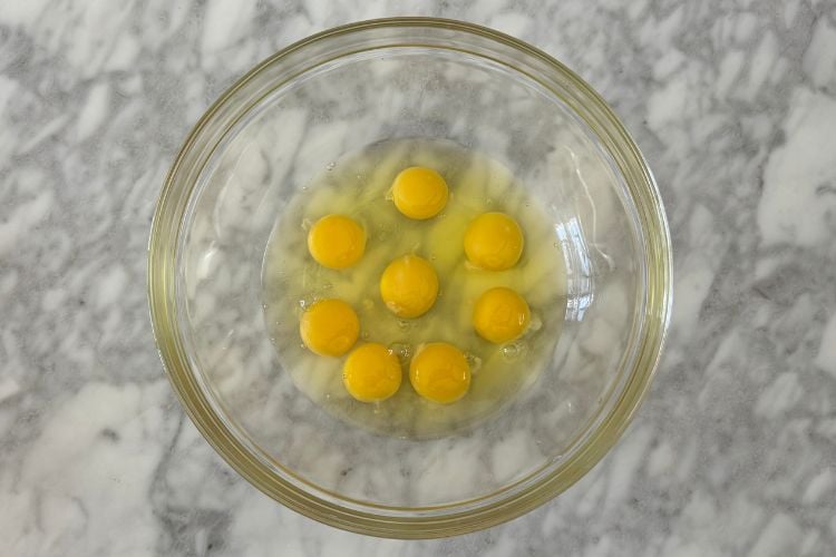 Eggs in a large mixing bowl