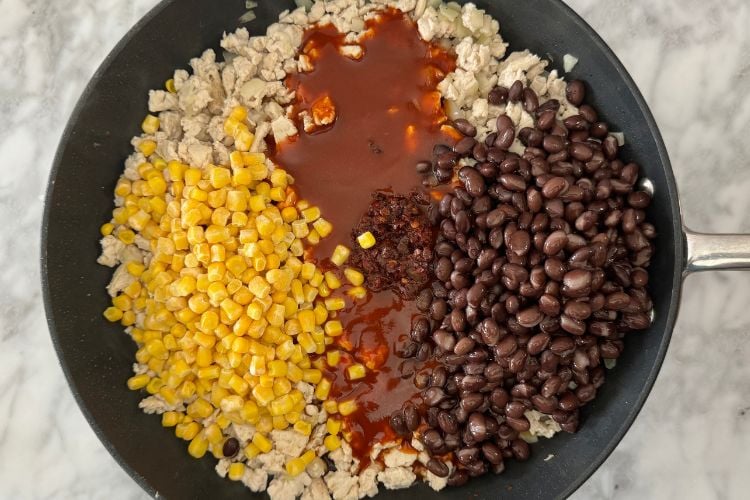 Enchilada sauce in pan