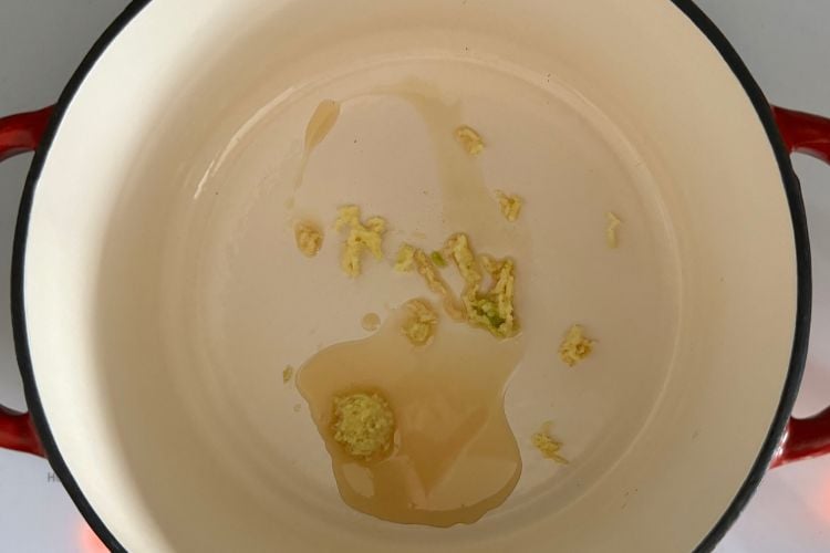 Ginger and garlic in a Dutch oven