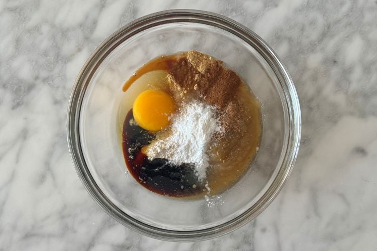 Gingerbread mug cake ingredients in bowl