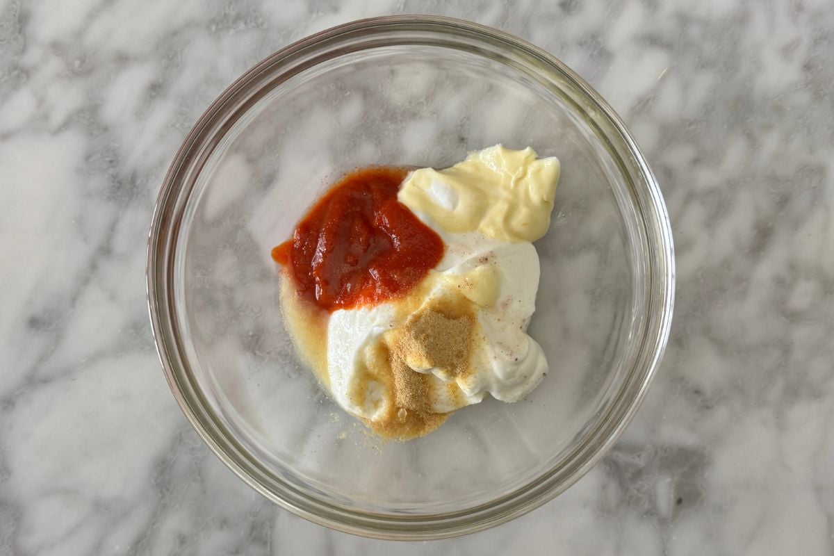 Greek yogurt and sriracha in a bowl
