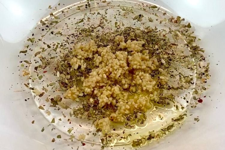 Herbs in bowl for roasted tomato soup