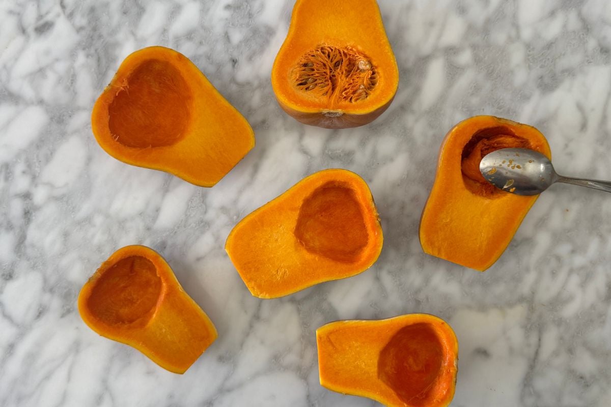 Honeynut squash cut in half with seeds removed