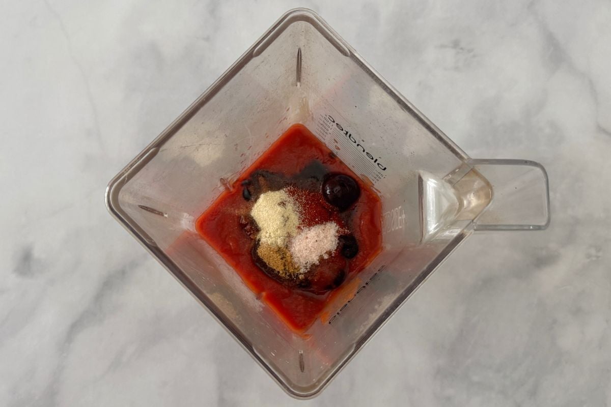 Ingredients for cherry BBQ sauce in a blender