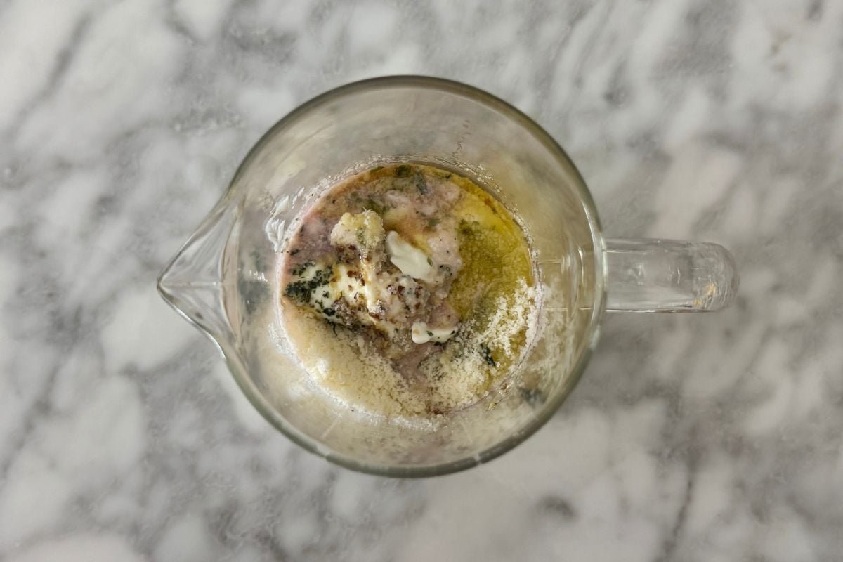 Ingredients for creamy Italian dressing in a bowl
