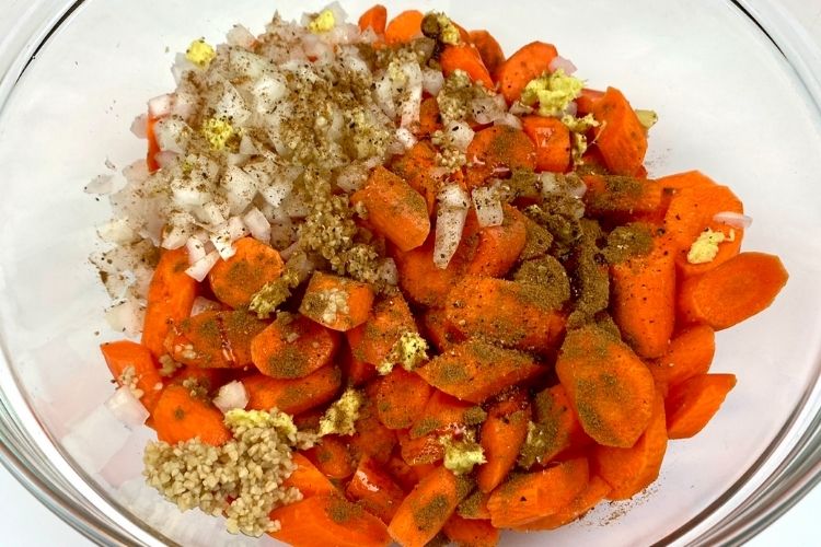 Ingredients in a bowl for the roasted carrot ginger soup