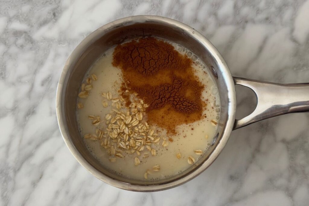 Ingredients in saucepan for protein oatmeal