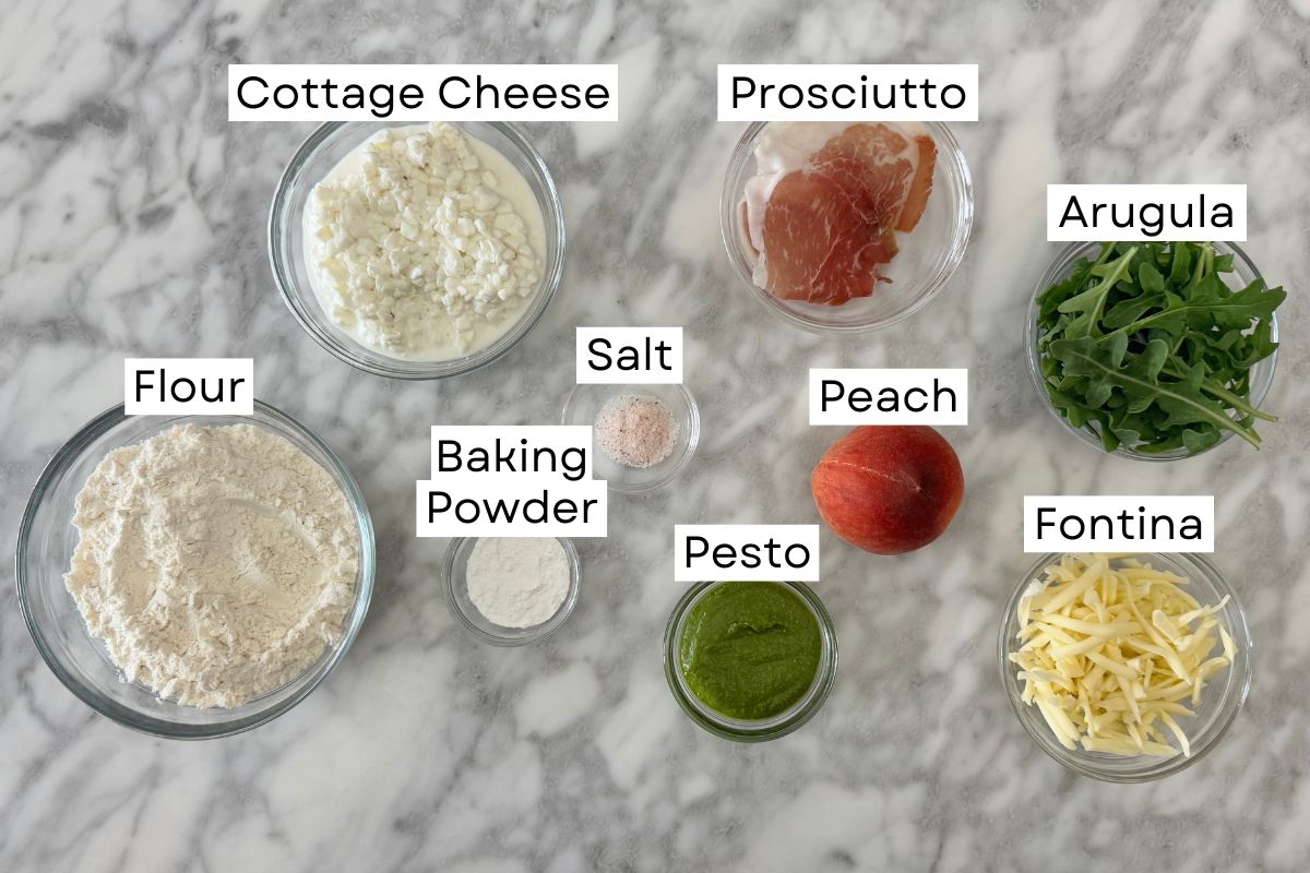 Ingredients needed for pesto peach prosciutto pizza