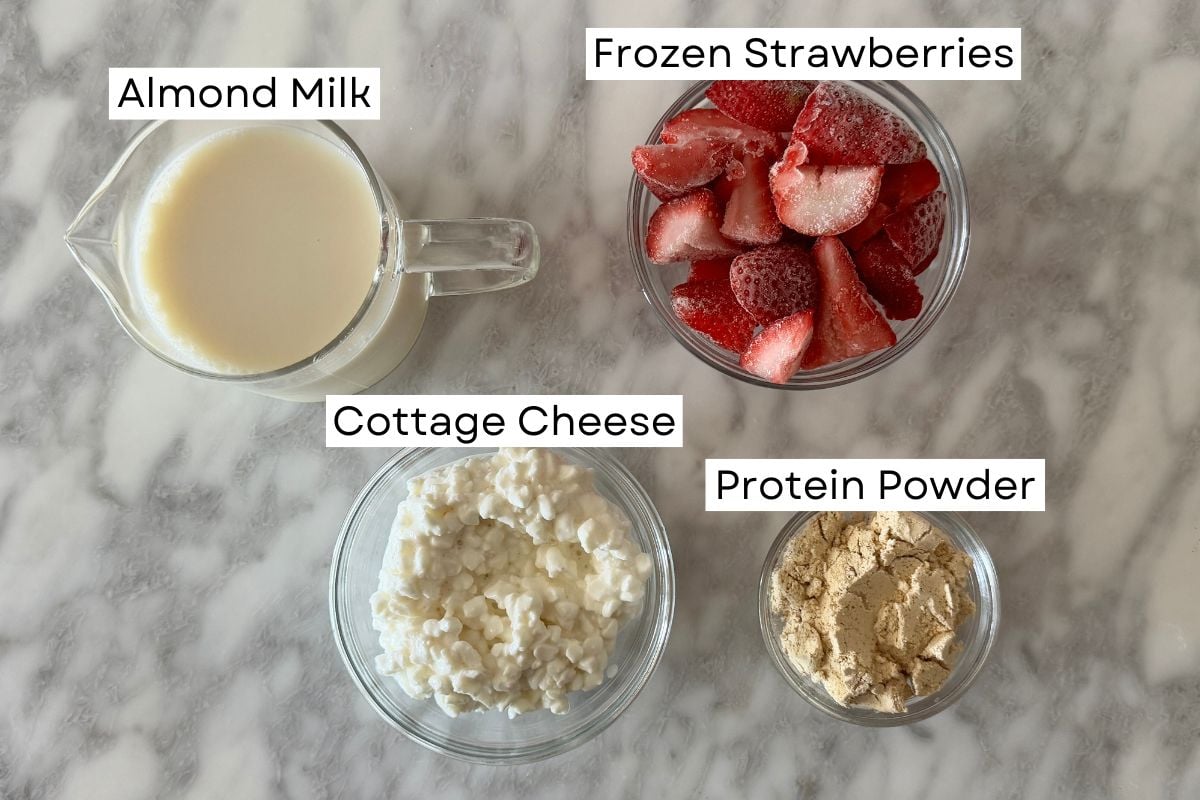 Ingredients needed for strawberry cottage cheese smoothie