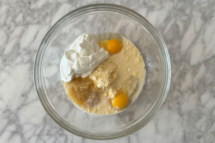 Jiffy Mix and casserole ingredients in bowl