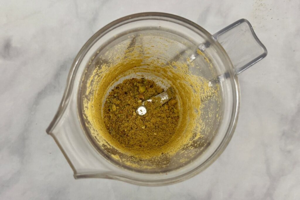 Lightly blended pistachios in blender