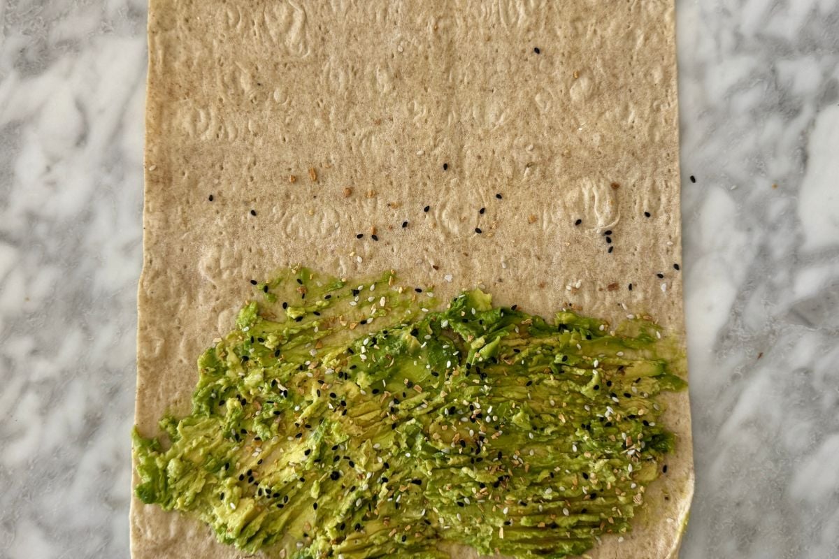 Mashed avocado on a lavash wrap