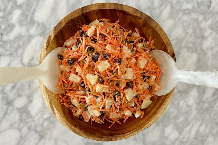 Mixed carrot raisin salad with dressing