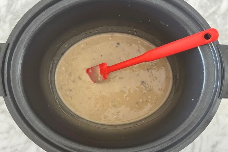Mixed condensed cream of mushroom soup and chicken broth