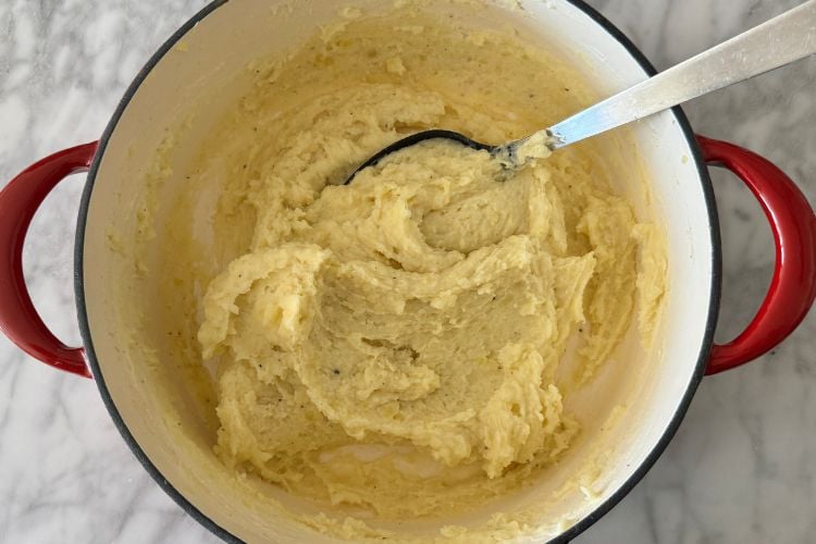 Mixed cottage cheese mashed potatoes in pan