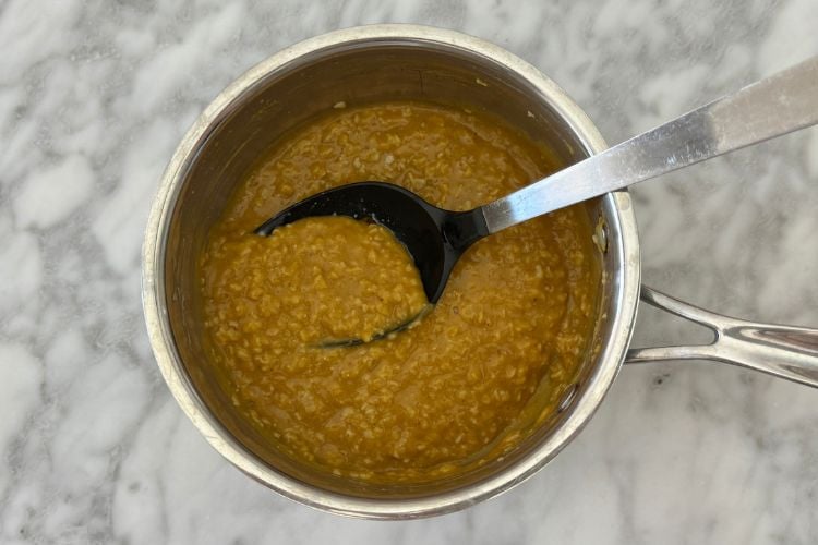 Mixed pumpkin oatmeal in saucepan