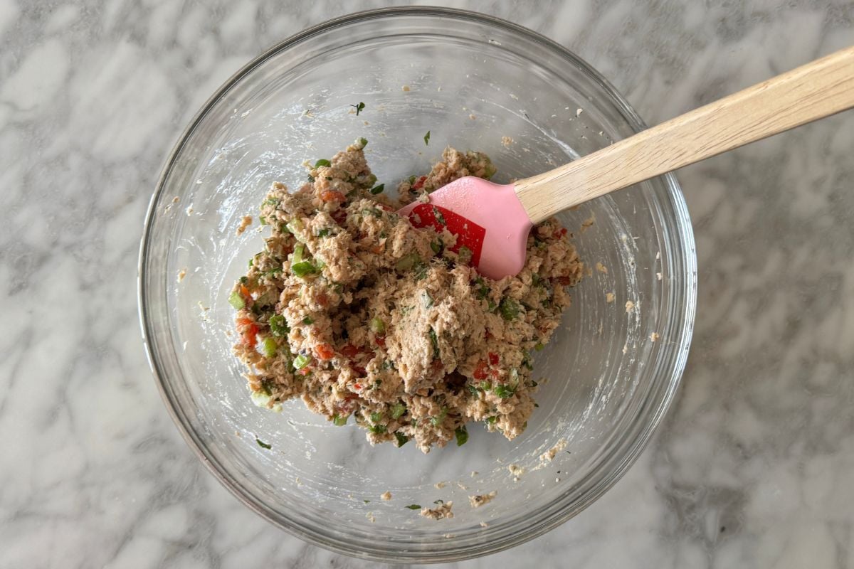 Mixed salmon salad in bowl
