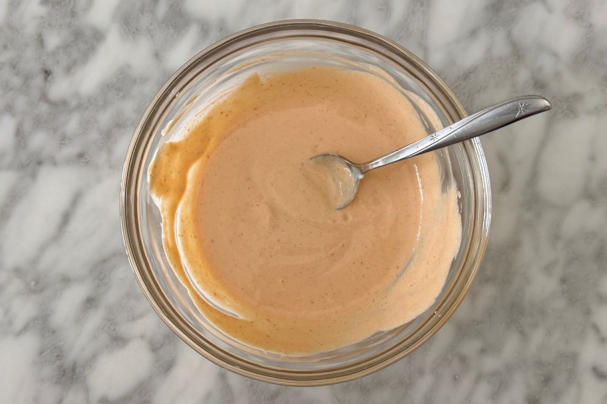 Mixed sriracha mayo with Greek yogurt in a bowl