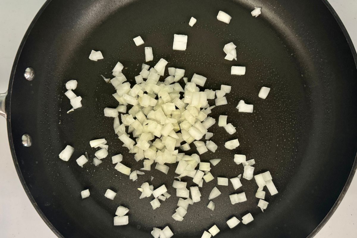 Onion in pan for burger bowls