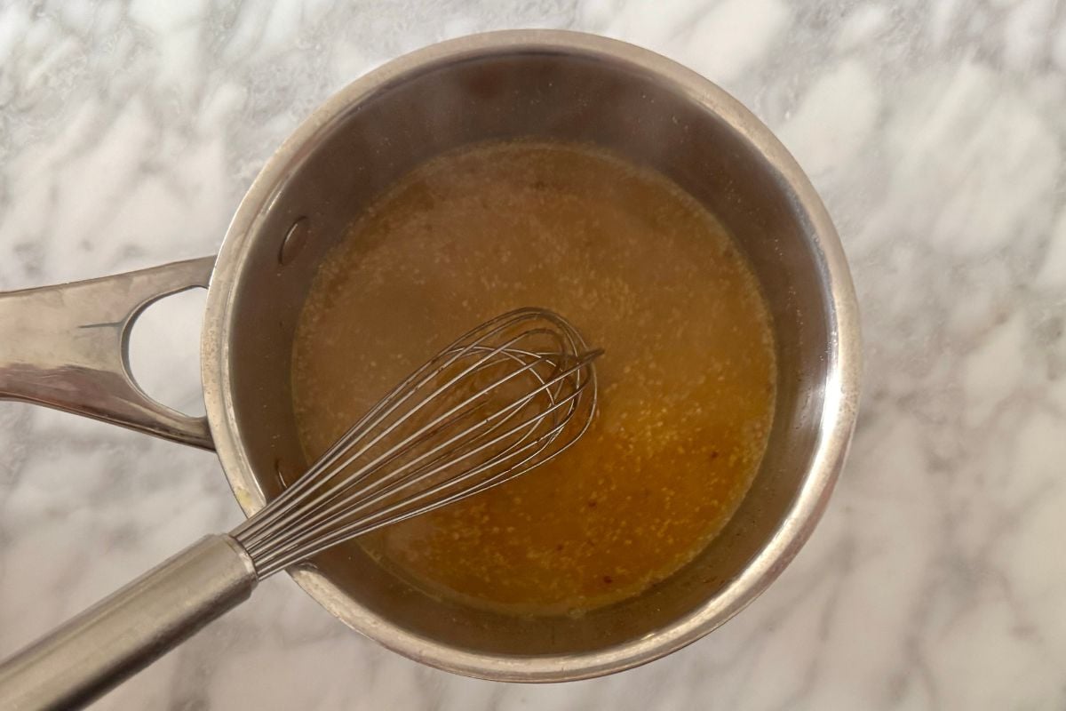 Orange and honey glaze in saucepan