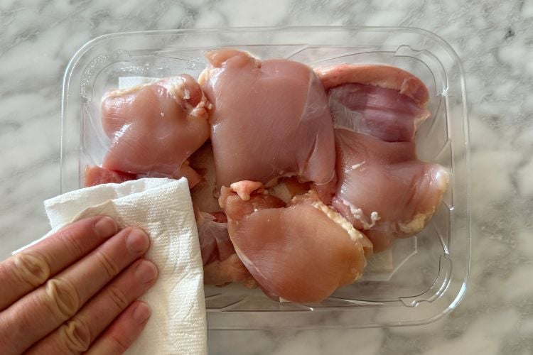 Pat dry boneless skinless chicken thighs