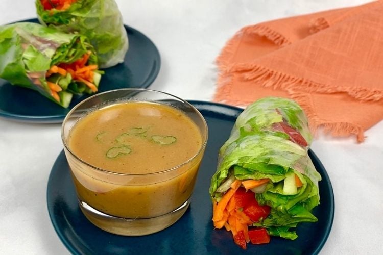 Peanut dipping sauce with spring rolls