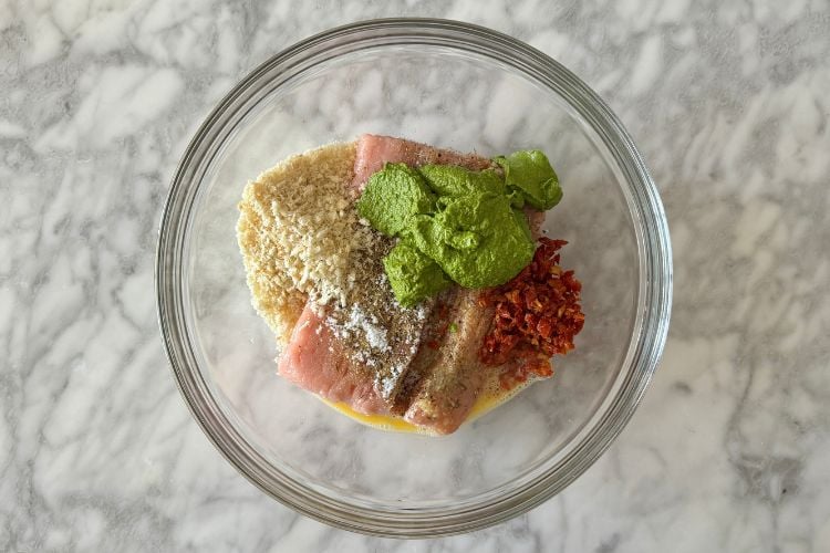 Pesto turkey meatballs ingredients in bowl