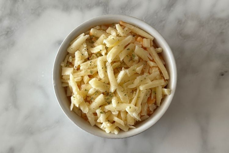 Pizza bowl topped with cheese