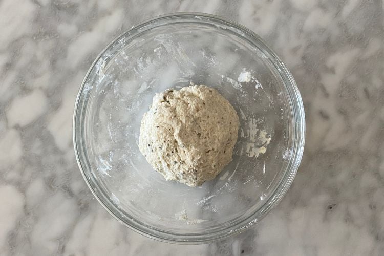Pizza dough ball in bowl