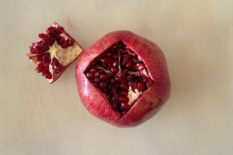 Pomegranate on cutting board