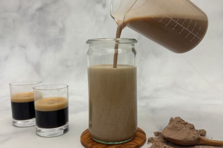Pouring coffee into a cup