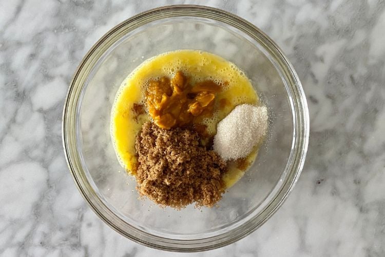 Pumpkin cookie ingredients in bowl