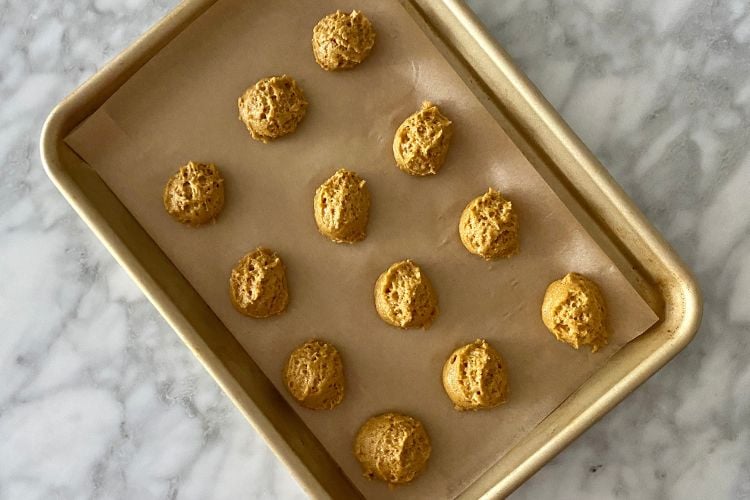 Pumpkin cookies on a sheet pan