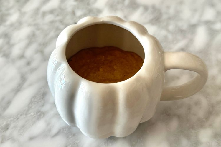 Pumpkin mug cake batter in mug