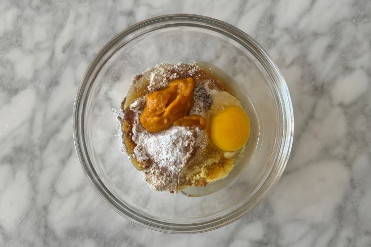 Pumpkin mug cake ingredients in bowl