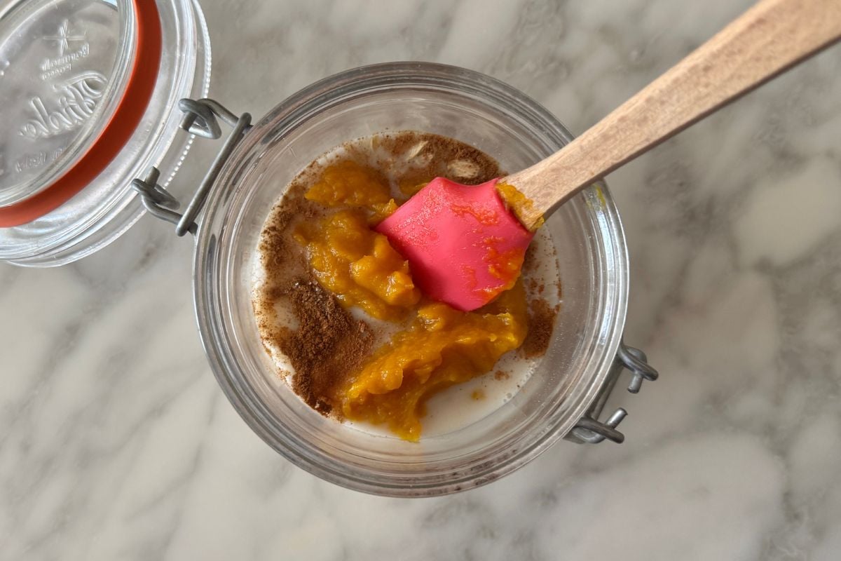 Pumpkin pie overnight oats ingredients in a jar